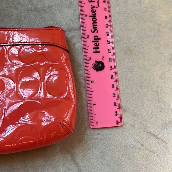 Coach Coral Orange Patent Embossed Logo Wristlet - Picture 9 of 10